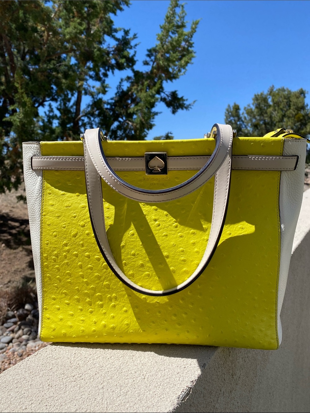 kate spade Yellow and Cream Tote with Gold Accent. Inside pockets and zip top